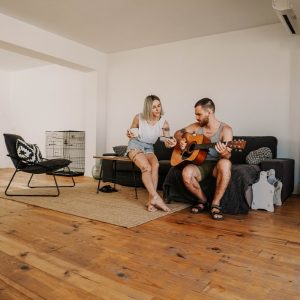 man and woman playing music